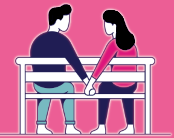 A couple holding hands on a park bench.